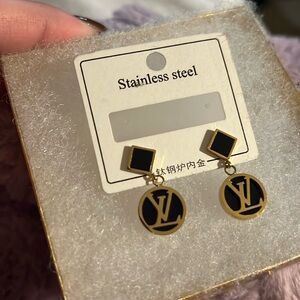 Gold and black earrings